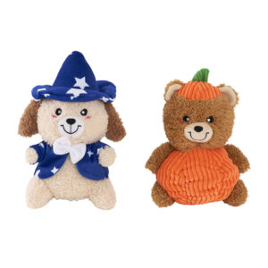 Two plush toys: a dog wearing a blue wizard hat and jacket, and a bear shaped like a pumpkin.