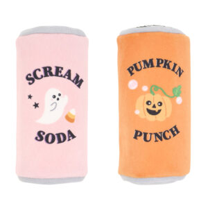 Two plush cylindrical toys: a pink “Scream Soda” can with a ghost and a candy corn, and an orange “Pumpkin Punch” can with a jack-o’-lantern.