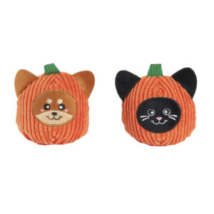 Two orange corduroy pumpkin dog toys, one featuring a dog face and one featuring a cat face.